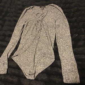 Long sleeve tie front body suit